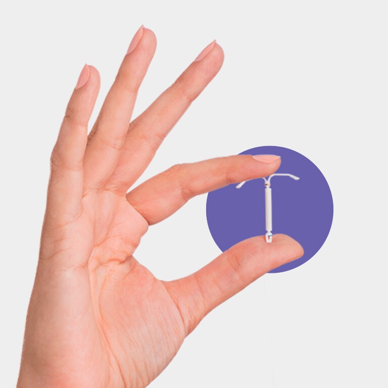 Hand holding Kyleena® (levonorgestrel-releasing intrauterine system) 19.5 mg IUD
